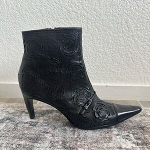 Chanel CC Logo Boots Camellia Flower Cut Out Black Leather Ankle Booties